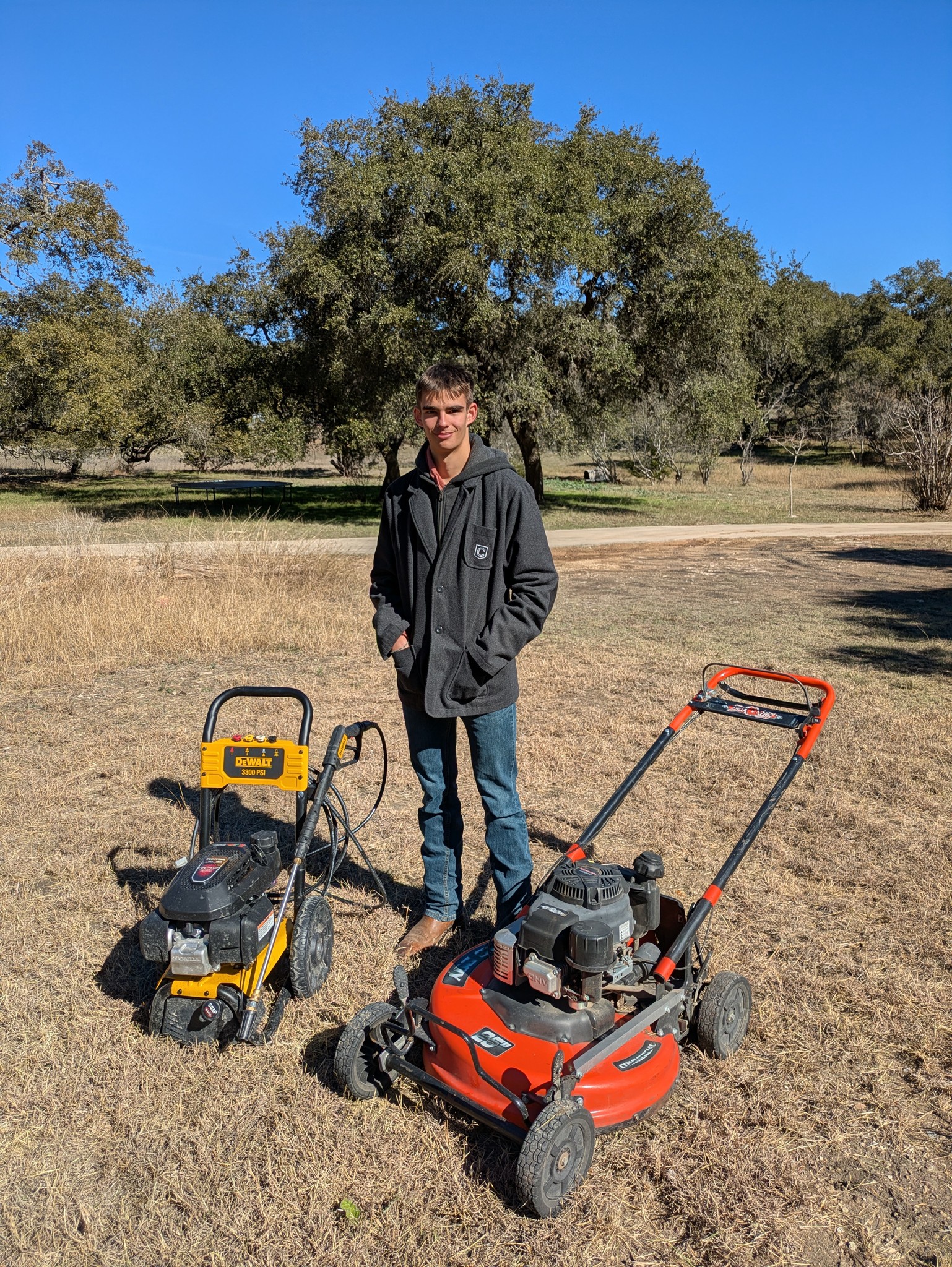 Sam with Bad Boy Mower and powerwasher